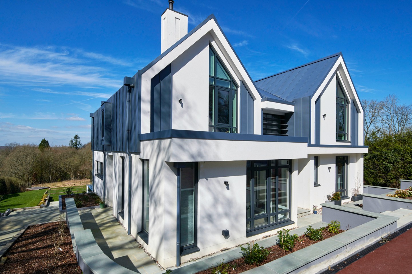 Outside shot of a white house and blue sky